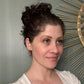 person wearing listed earrings