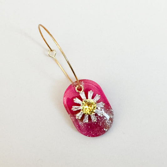 Small pink, polymer clay piece with a cubic zirconia daisy 